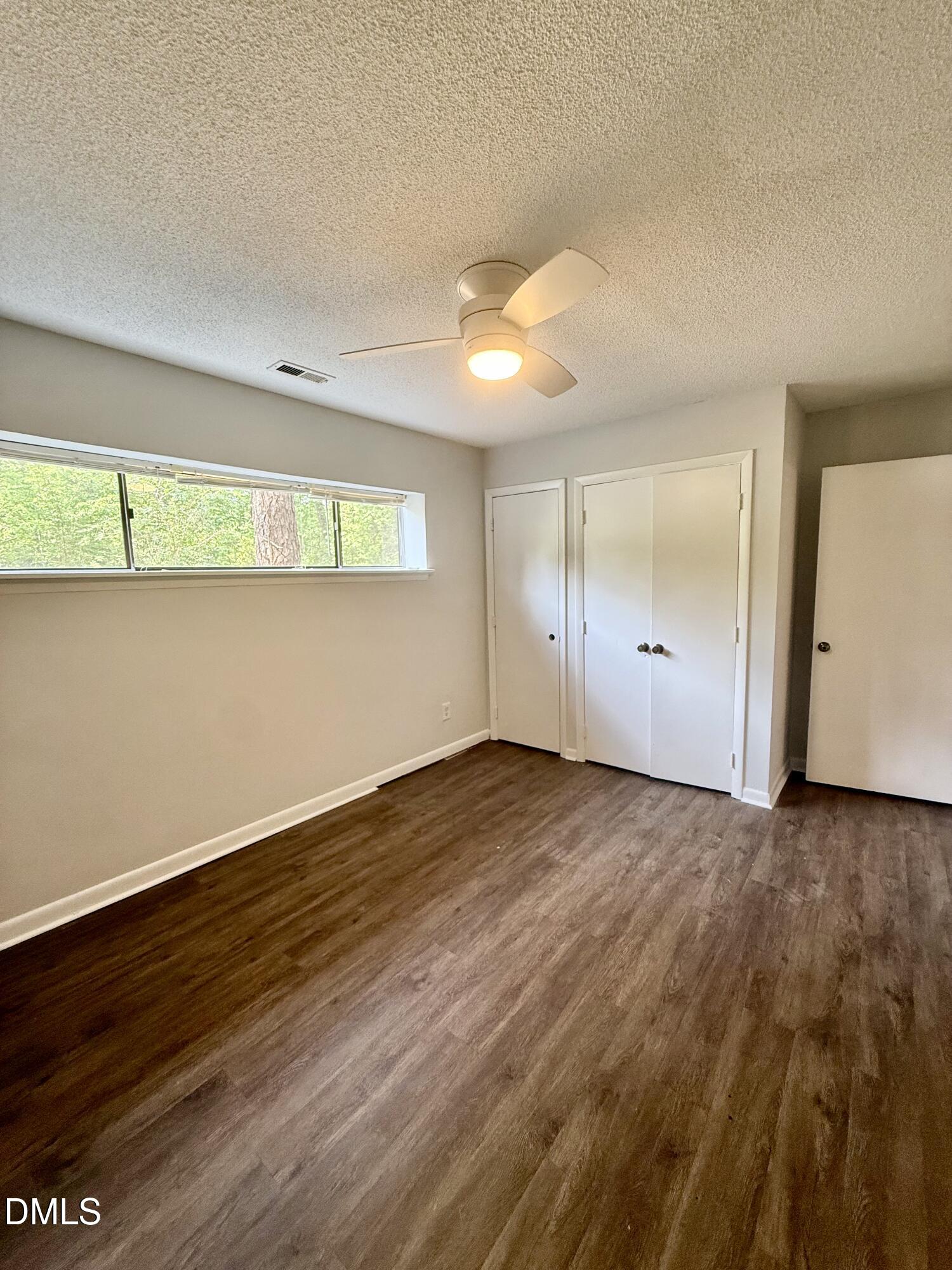 546 Pine Ridge Place Raleigh, NC 27609 - Photo 14 of 28 wooden floor in an empty room