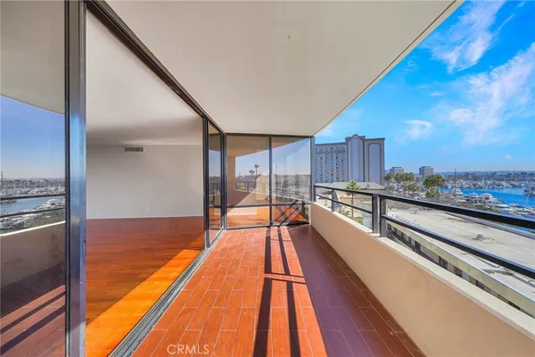 a view of a living room with a balcony