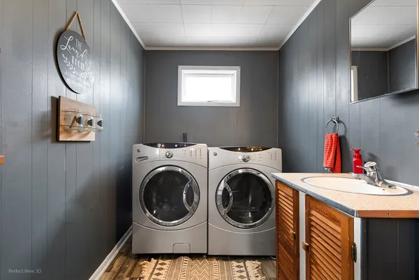 a utility room with dryer and washer