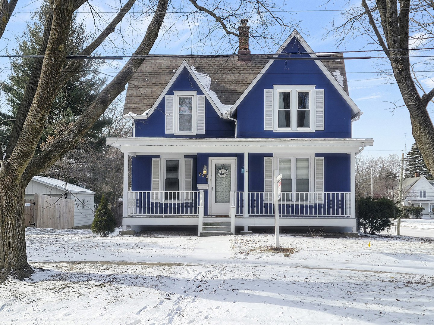 733 North 13th Street DeKalb, IL 60115 - Photo 2 of 22 a front view of a house with a yard