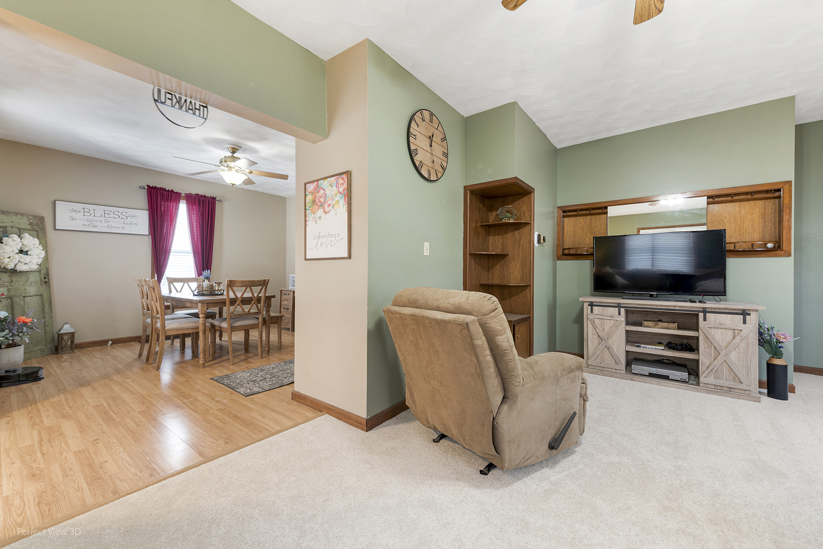 733 North 13th Street DeKalb, IL 60115 - Photo 4 of 22 a living room with furniture and a flat screen tv