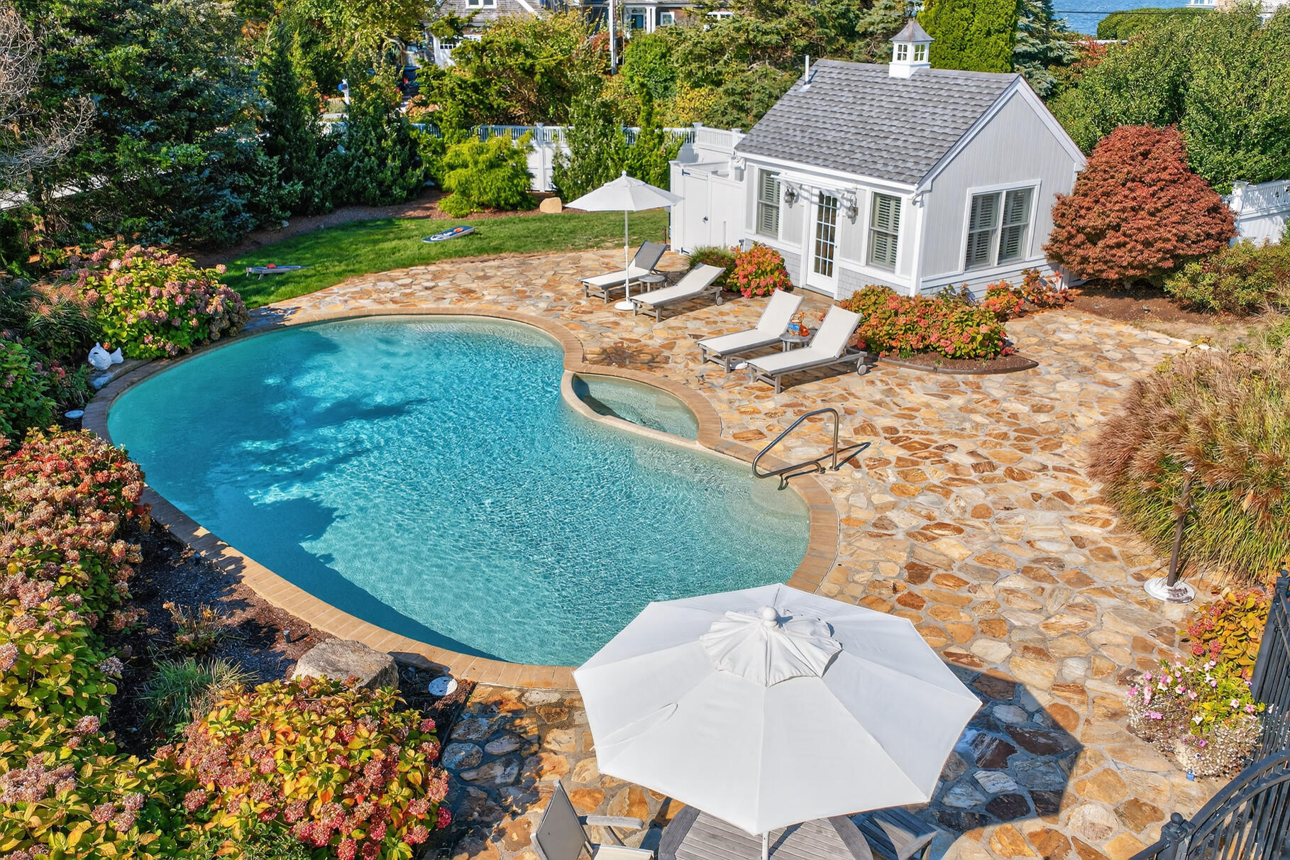 40 Point Road North Falmouth, MA 02556 - Photo 12 of 73 a aerial view of a house with swimming pool and patio