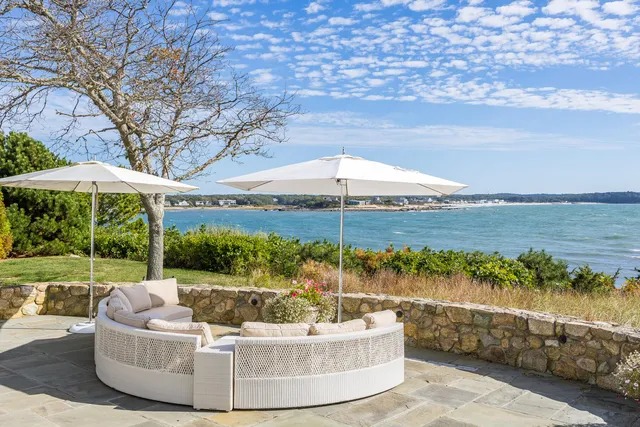 a view of a chairs and table on the terrace