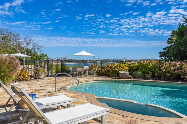 a view of a balcony with an ocean view