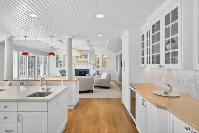 a bedroom with a large bed and a large window