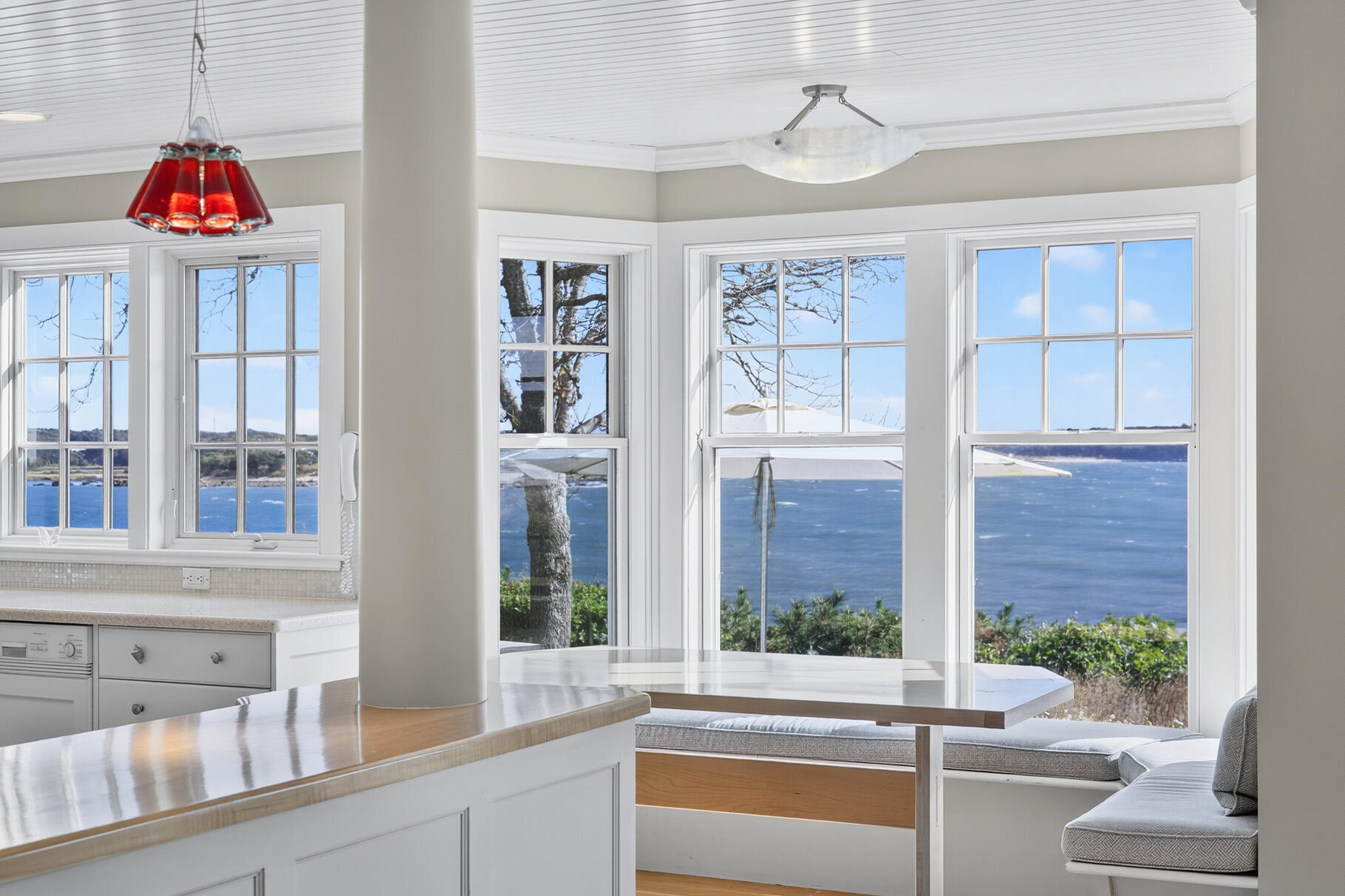 40 Point Road North Falmouth, MA 02556 - Photo 32 of 73 a living room with furniture and a floor to ceiling window