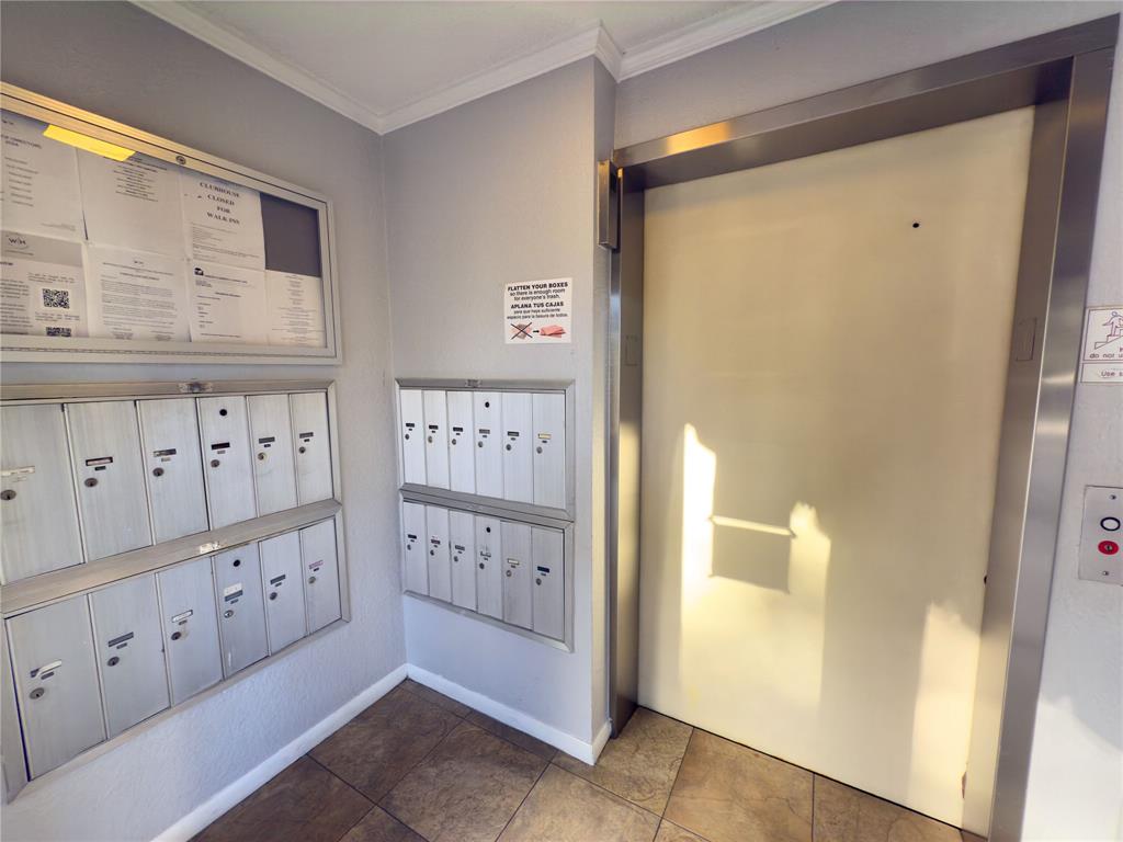 1701 Whitehall Drive, Unit 303 Davie, FL 33324 - Photo 33 of 33 a view of a hallway with elevator