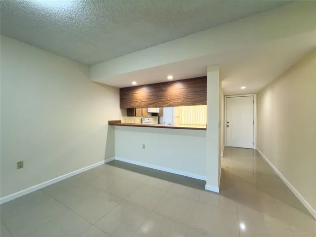 a kitchen with a sink and window
