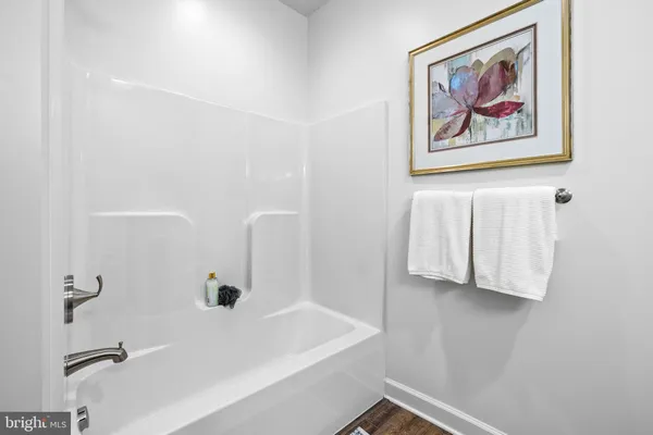 a bathroom with a sink and a bathtub