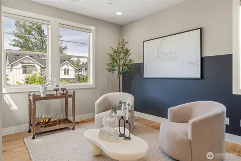 a workspace with furniture and a window