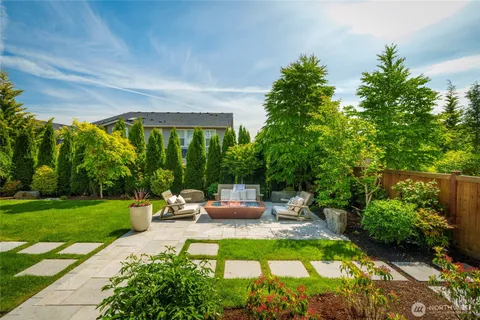 a garden view with a sitting space