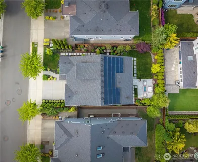 an aerial view of a house with a garden