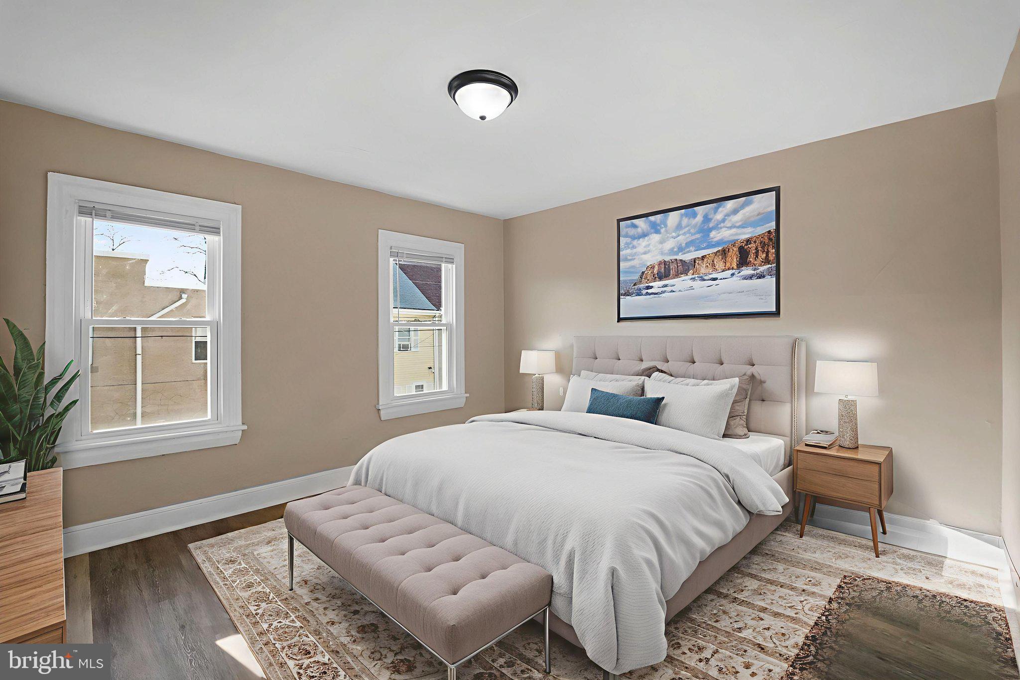 237 Morris Street Gloucester City, NJ 08030 - Photo 29 of 44 a bedroom with bed and a window