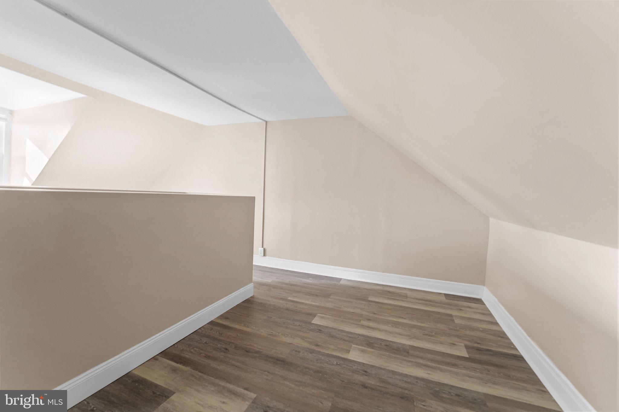 237 Morris Street Gloucester City, NJ 08030 - Photo 33 of 44 an empty room with wooden floor