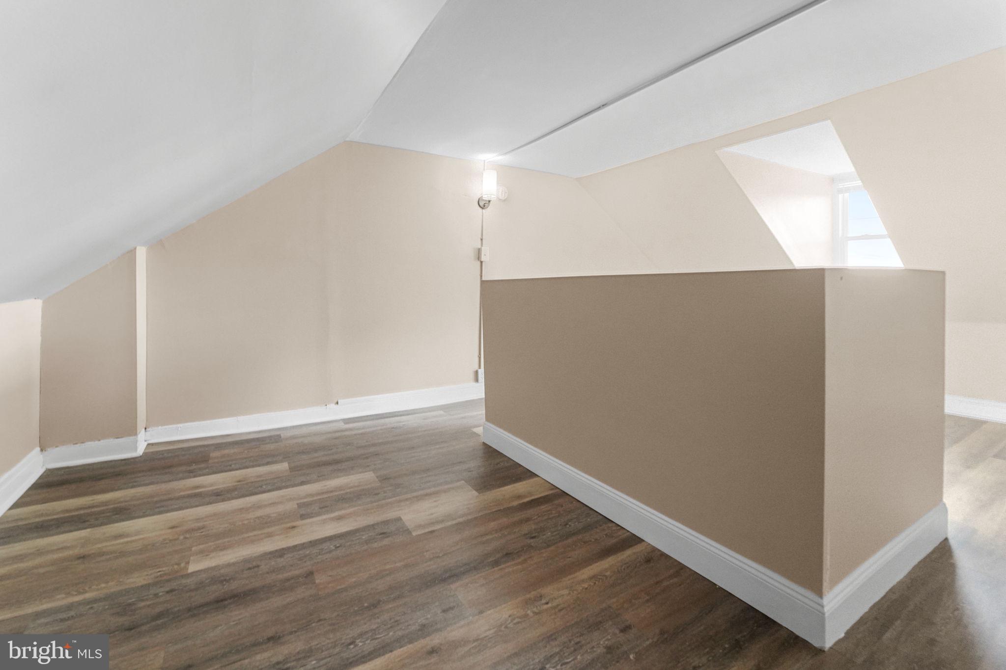 237 Morris Street Gloucester City, NJ 08030 - Photo 35 of 44 a view of an empty room with wooden floor