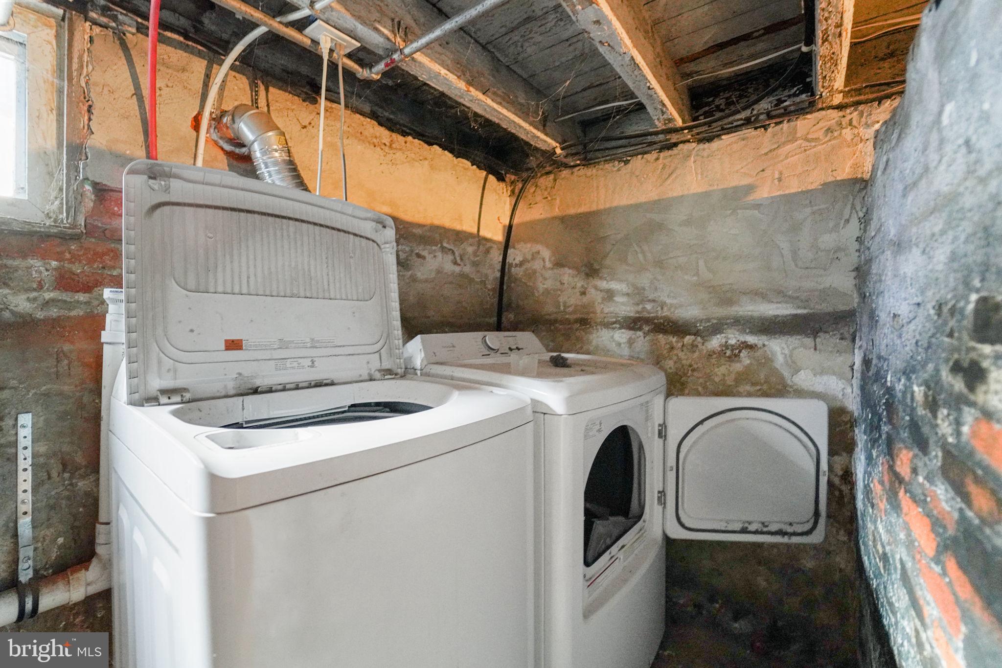 237 Morris Street Gloucester City, NJ 08030 - Photo 38 of 44 a utility room with dryer and washer