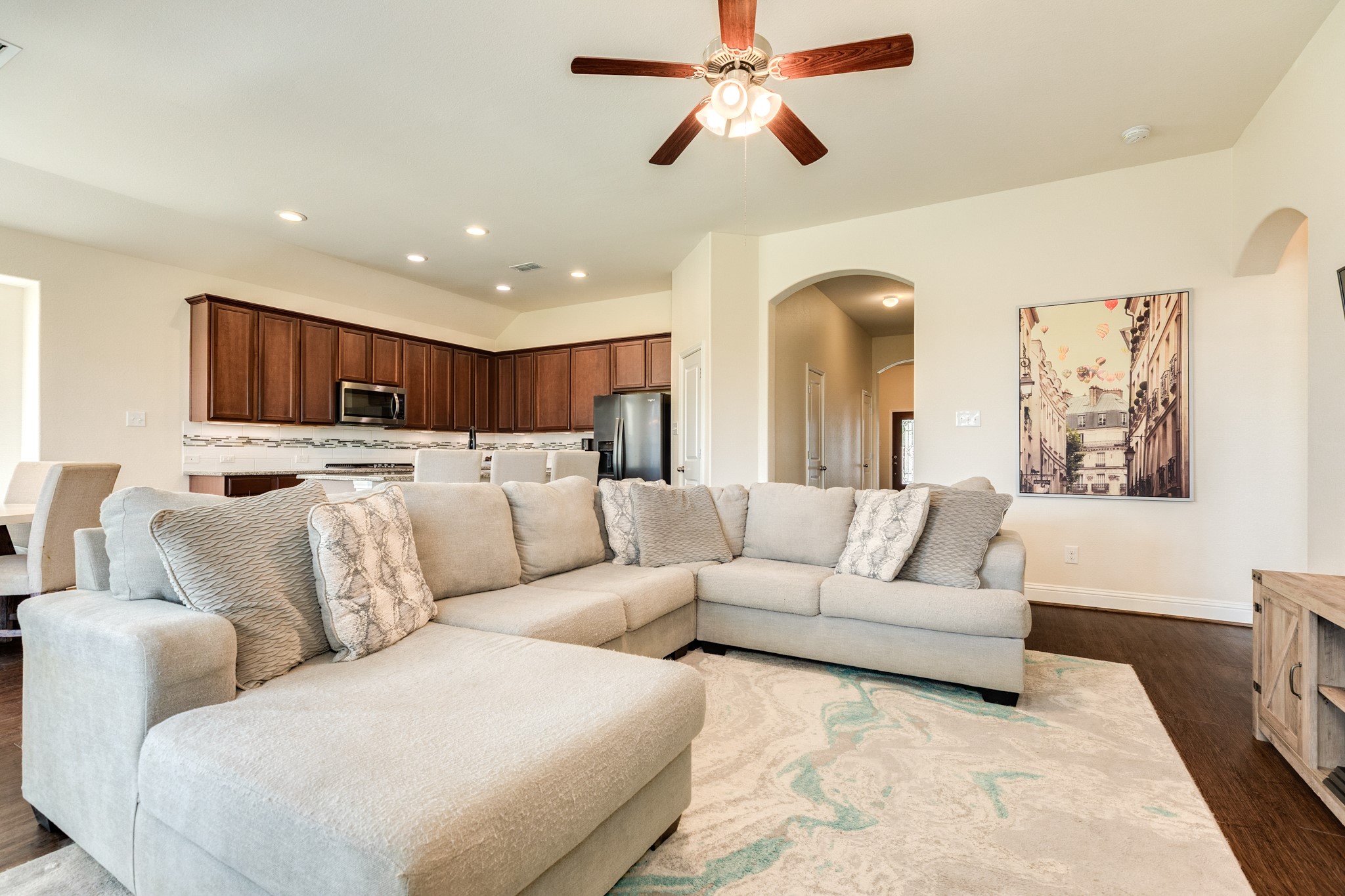 3519 Bay Drive Rosharon, TX 77583 - Photo 11 of 49 Spacious open-concept kitchen and dining area located at the rear of the home, featuring a seamless flow and private entrance to the primary bedroom suite.