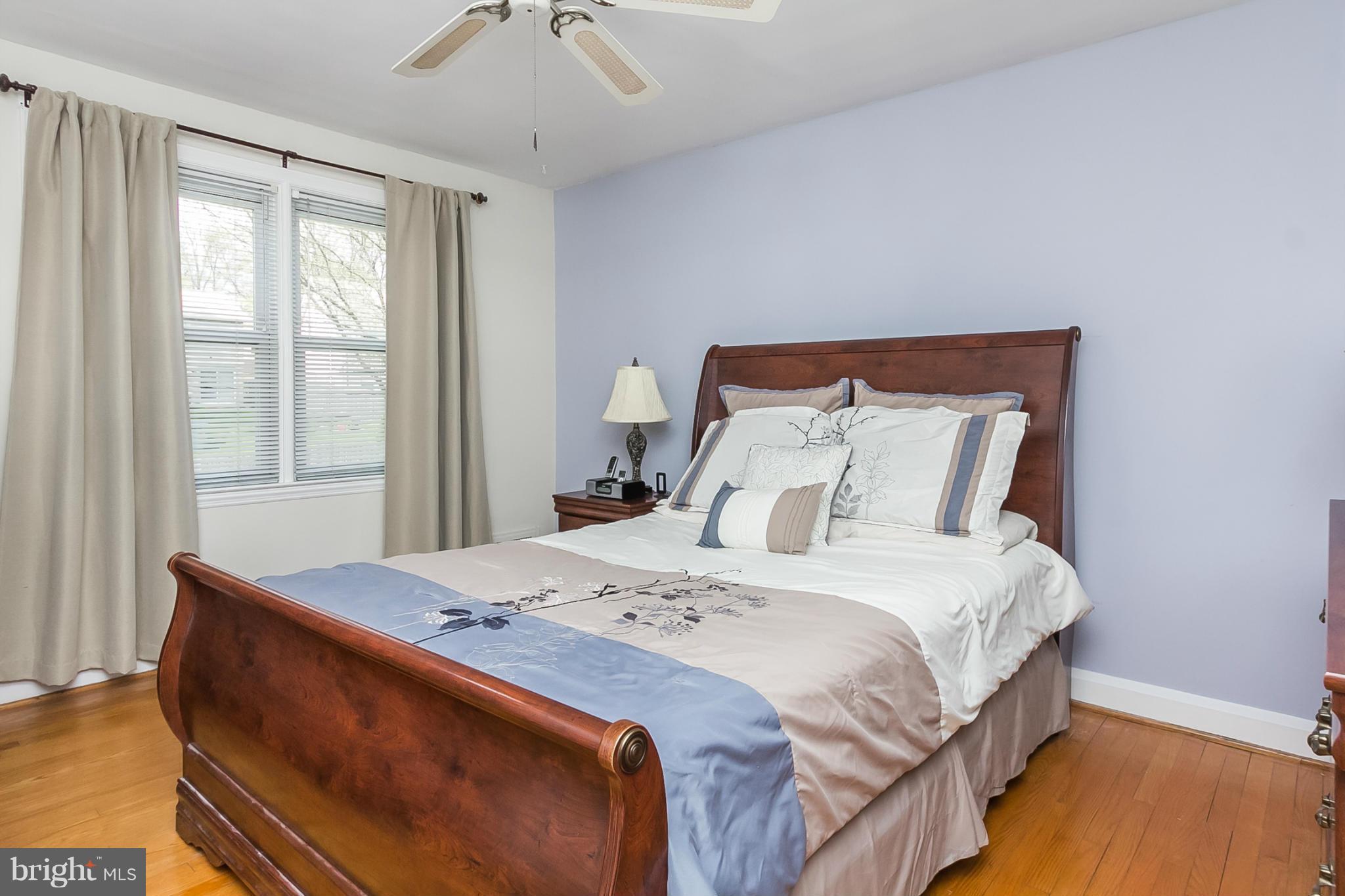 1156 Newfield Road Baltimore, MD 21207 - Photo 14 of 23 a bedroom with a bed and window