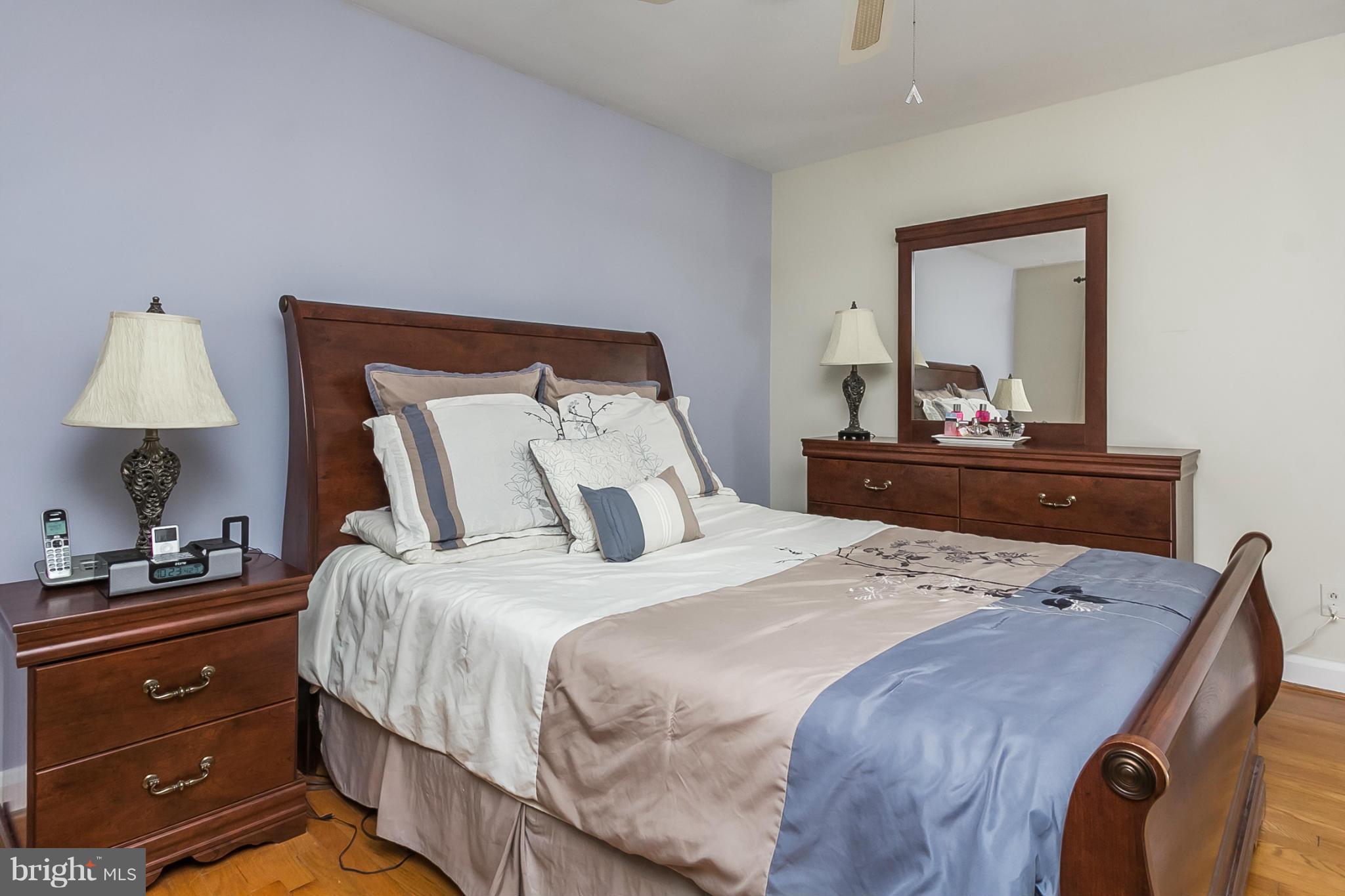 1156 Newfield Road Baltimore, MD 21207 - Photo 15 of 23 a bedroom with a bed and a dresser