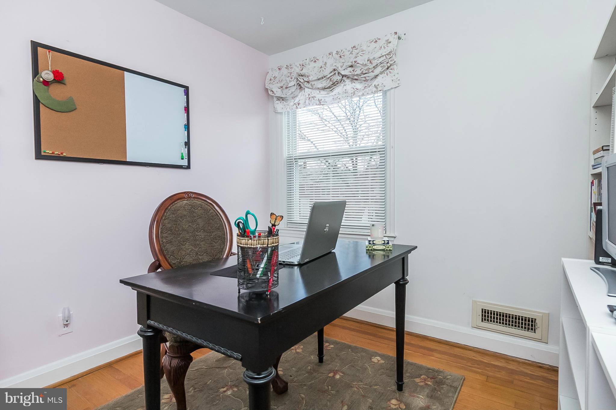1156 Newfield Road Baltimore, MD 21207 - Photo 17 of 23 a workspace with furniture and window