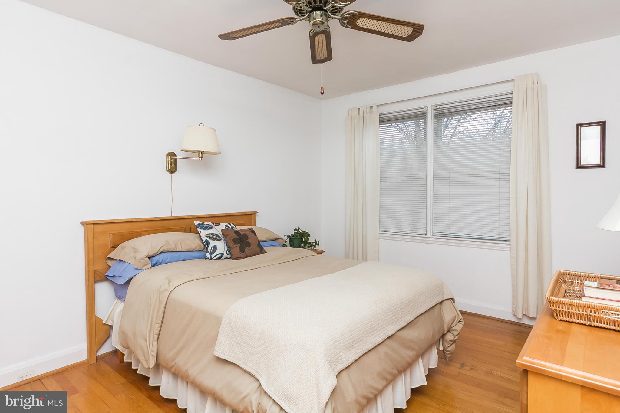 1156 Newfield Road Baltimore, MD 21207 - Photo 18 of 23 a bedroom with bed and window