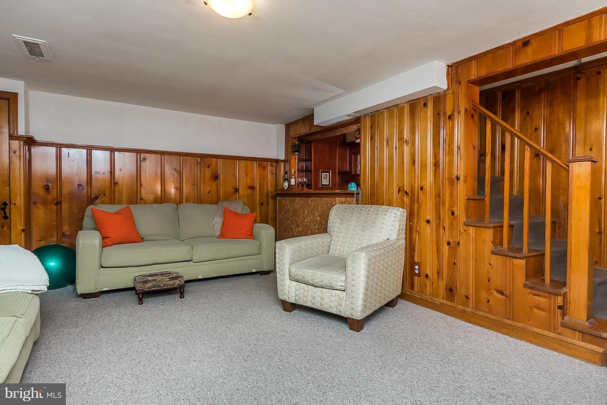 1156 Newfield Road Baltimore, MD 21207 - Photo 20 of 23 a living room with furniture and a window