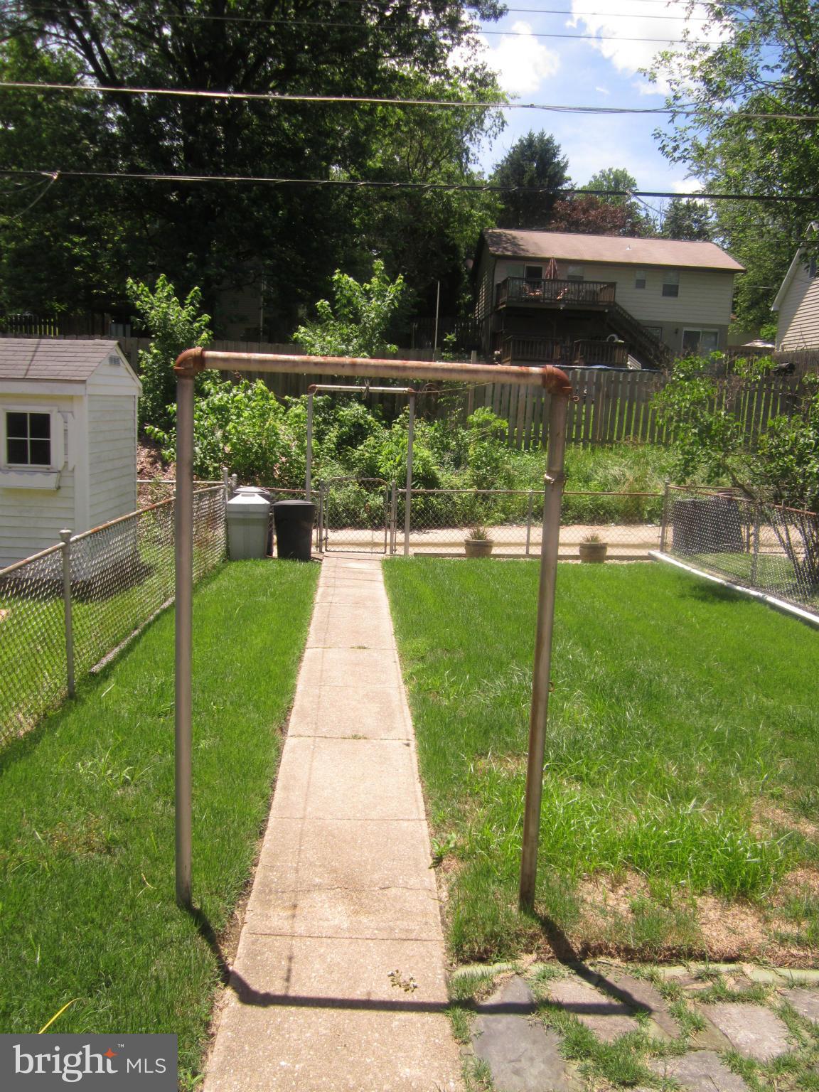 1156 Newfield Road Baltimore, MD 21207 - Photo 23 of 23 a backyard of a house with lots of green space