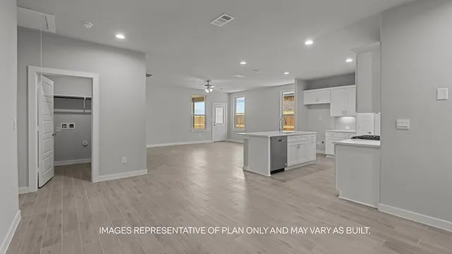 a view of kitchen with wooden floor