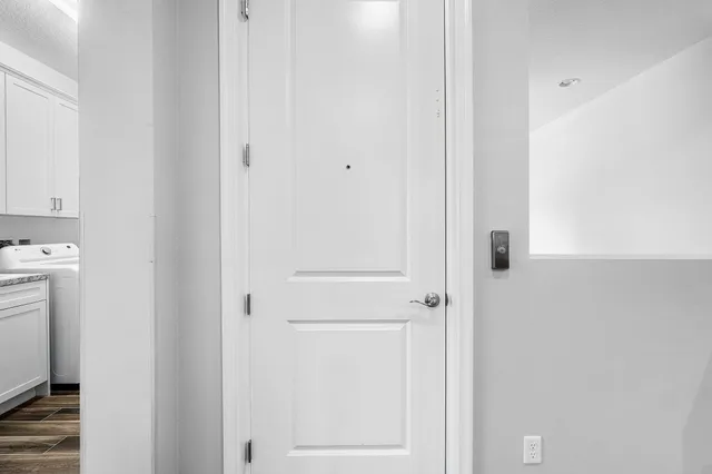 a view of a dining room with furniture and window