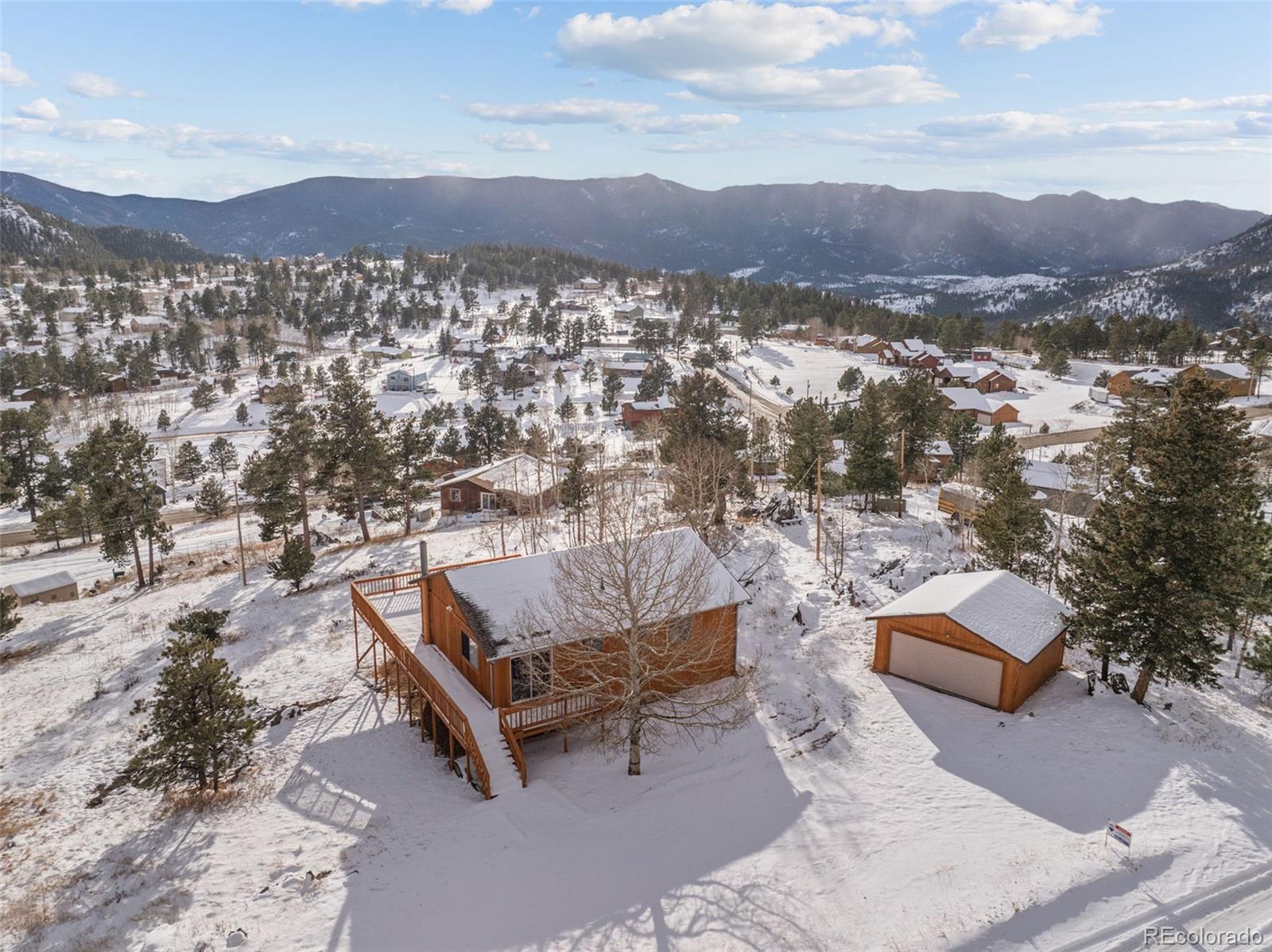 an aerial view of residential house and outdoor space