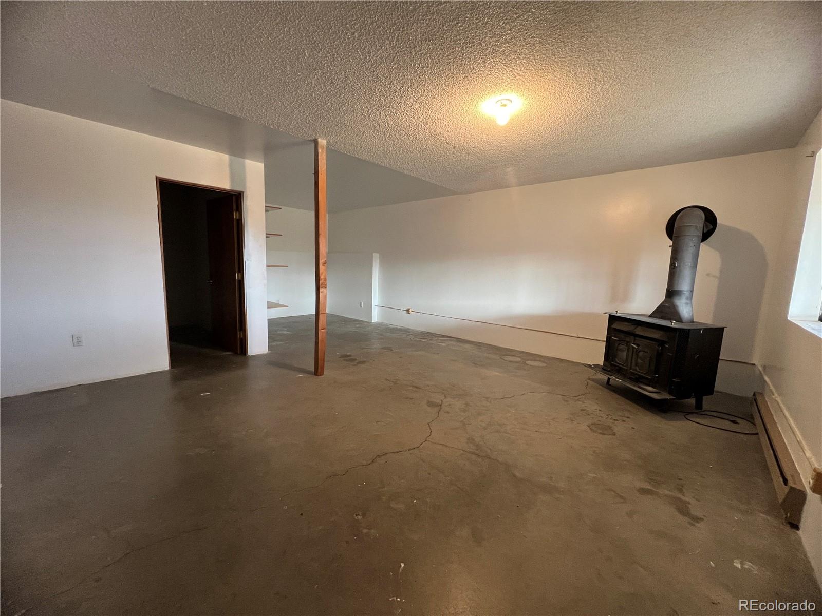 52 Deer Trail Drive Bailey, CO 80421 - Photo 17 of 40 a view of empty room with ceiling fan