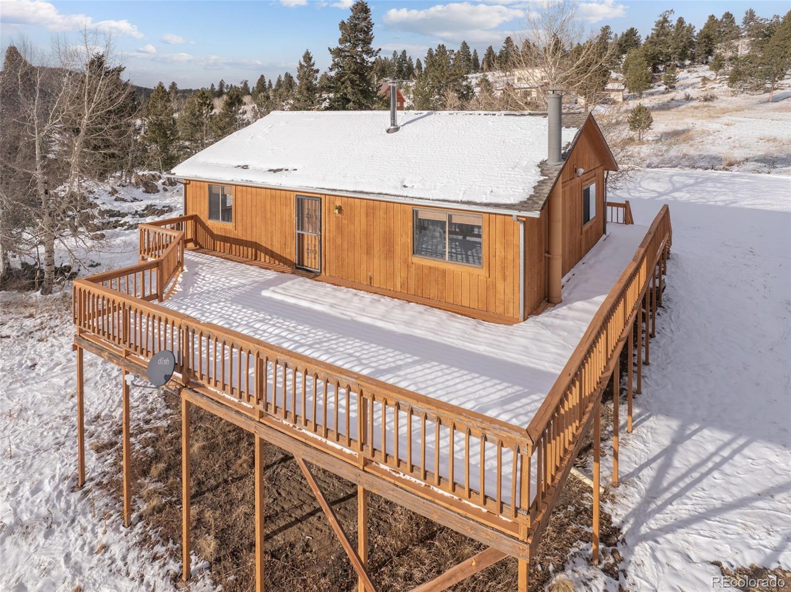 52 Deer Trail Drive Bailey, CO 80421 - Photo 38 of 40 a view of a house with terrace