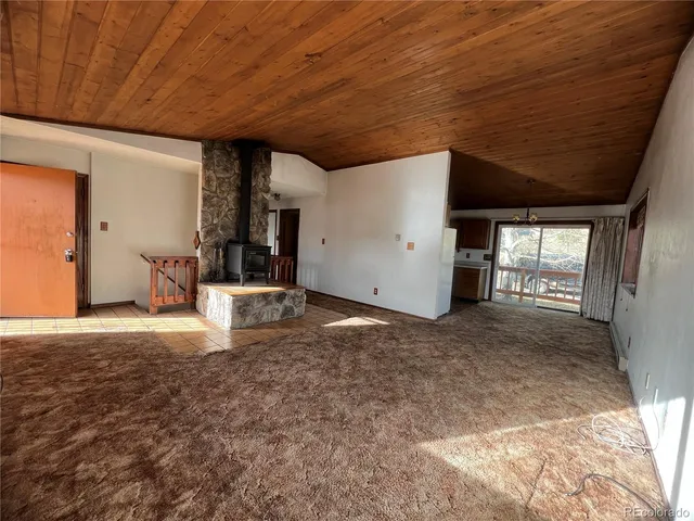 a view of empty room with windows