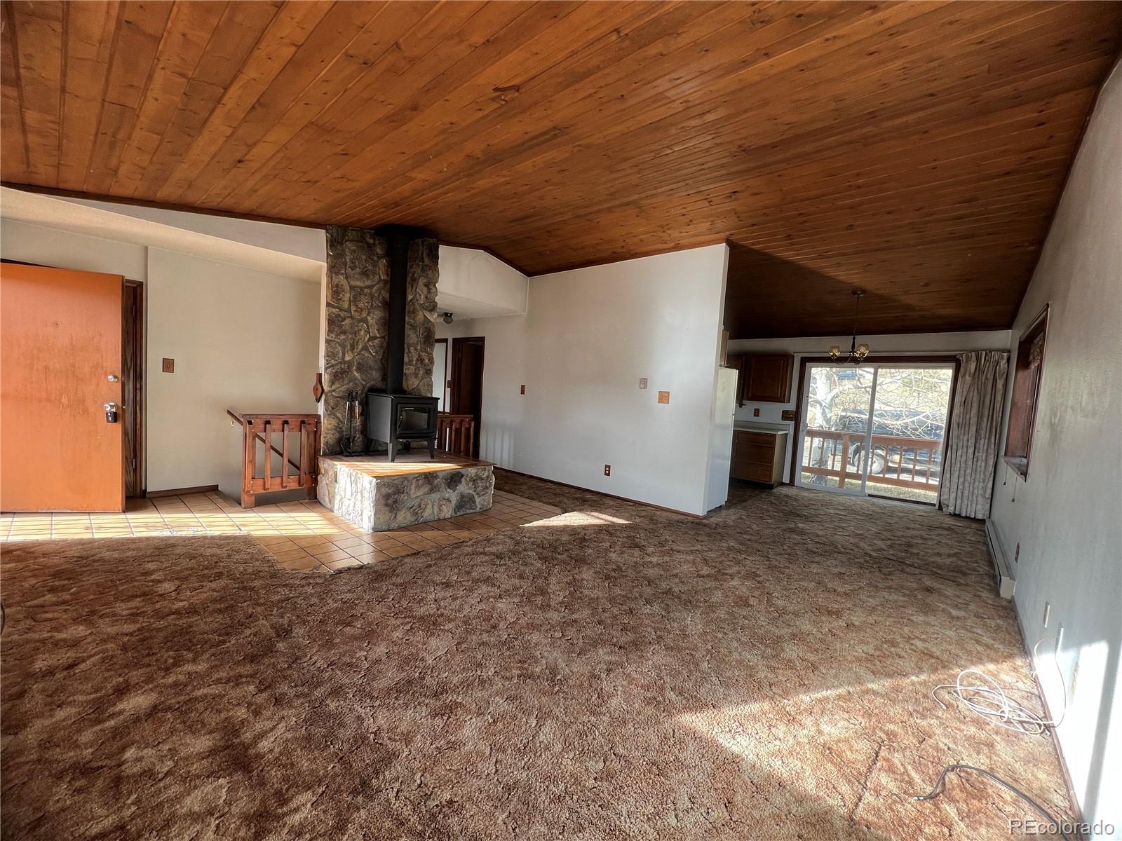 52 Deer Trail Drive Bailey, CO 80421 - Photo 9 of 40 a view of empty room with windows