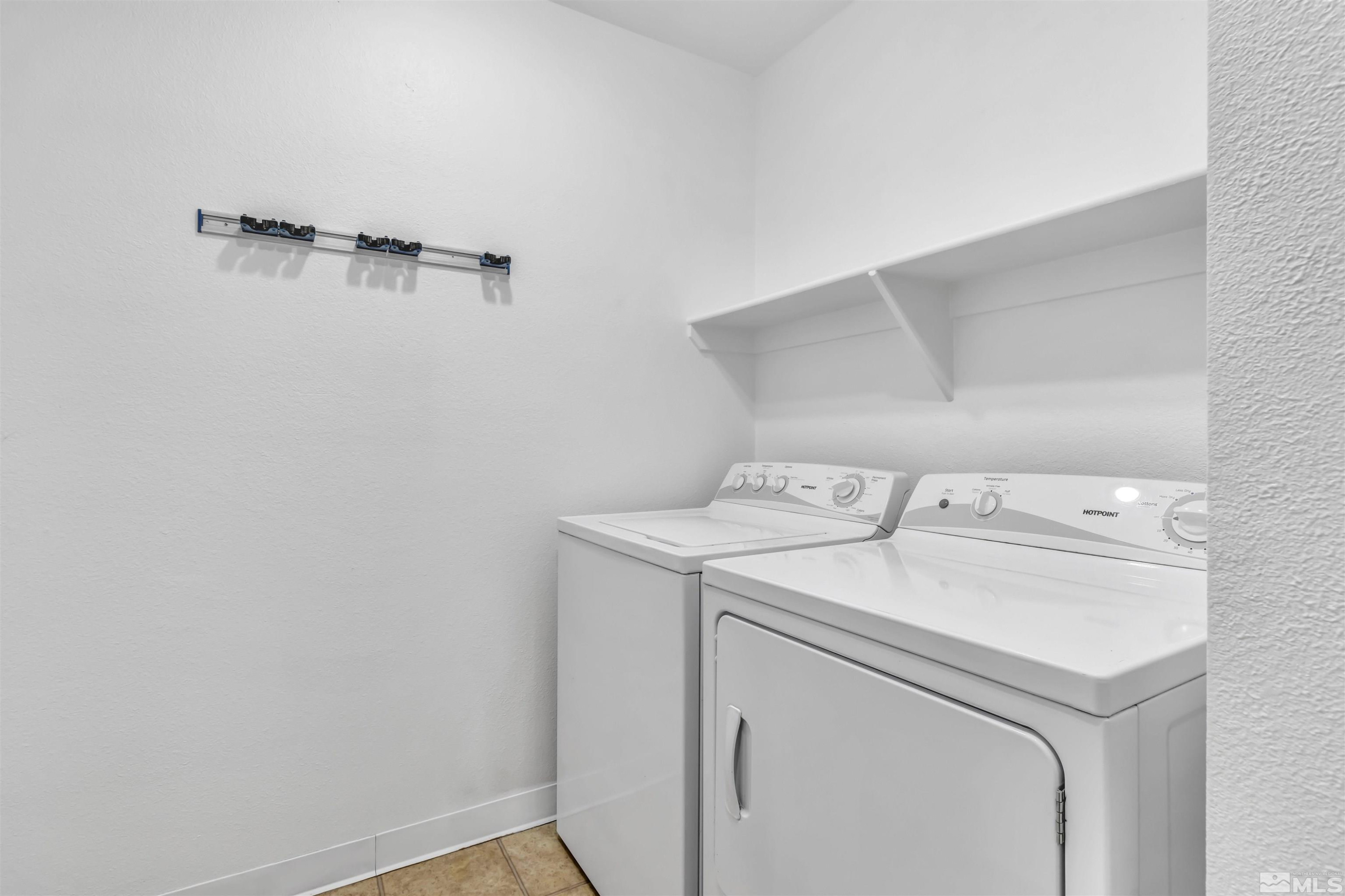 6850 Sharlands Avenue, Unit 1036 Reno, NV 89523 - Photo 23 of 36 a utility room with dryer and washer