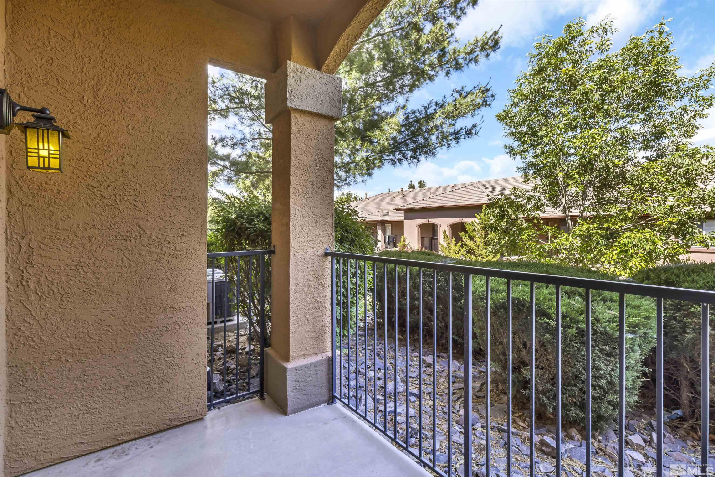 6850 Sharlands Avenue, Unit 1036 Reno, NV 89523 - Photo 27 of 36 a view of a balcony with outside view