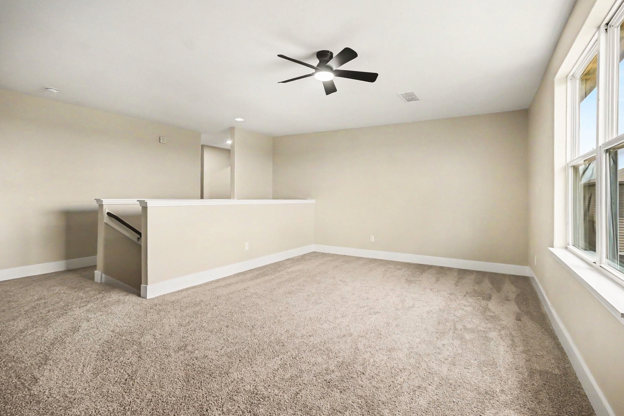 1322 Diamond Drape Drive Rosharon, TX 77583 - Photo 24 of 45 wooden floor in an empty room with a window