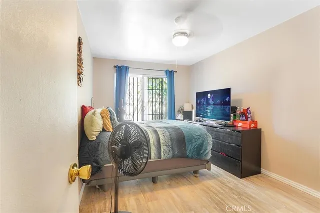 a living room with furniture fireplace and window