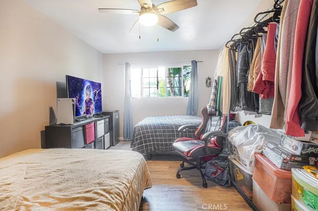 a bedroom with a bed and furniture