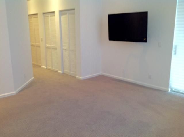 a spacious bathroom with a bathtub and a shower