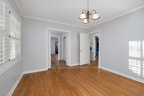 a kitchen with stainless steel appliances a refrigerator sink and cabinets