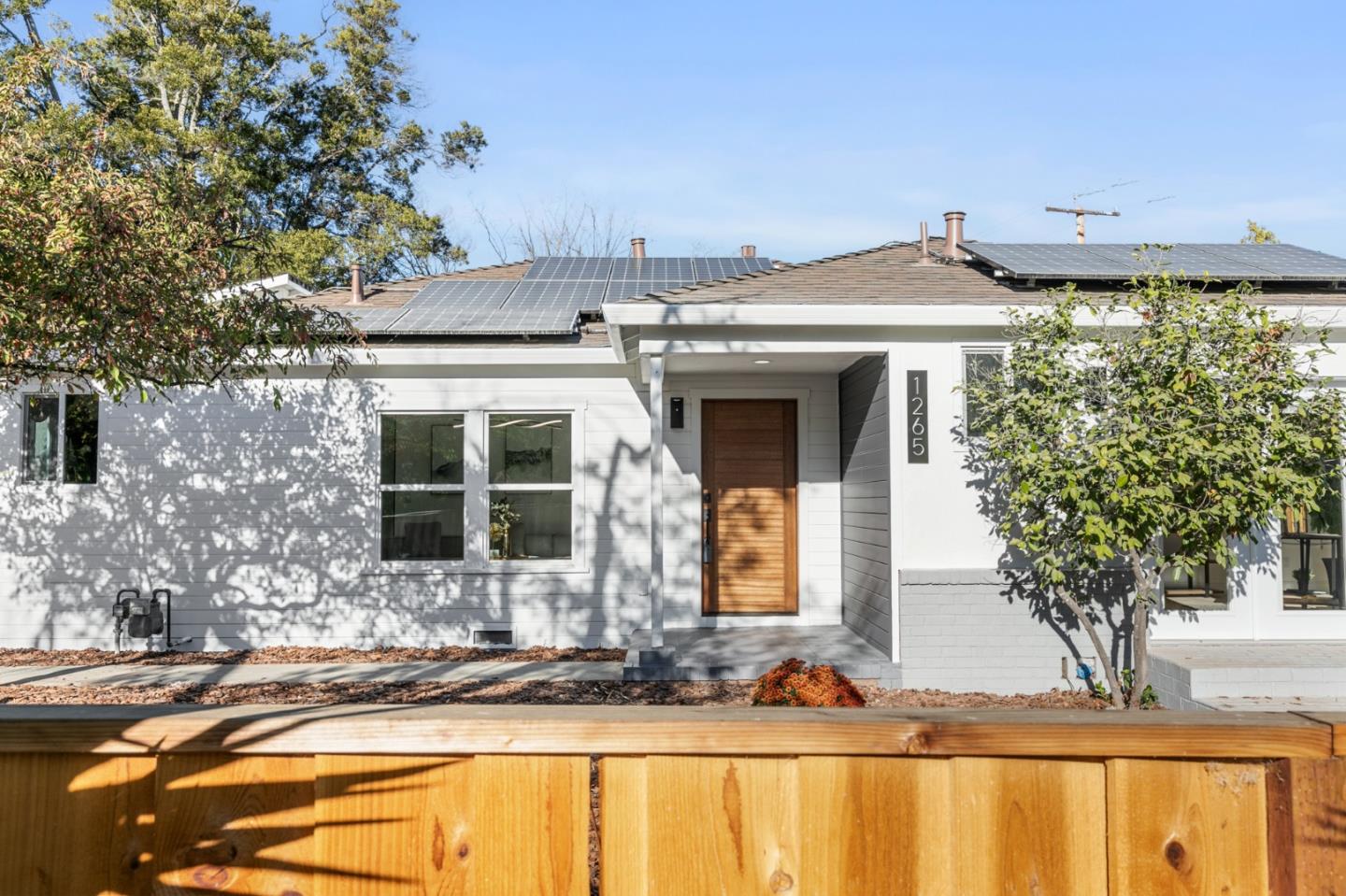 1265 Burrows Road Campbell, CA 95008 - Photo 1 of 42 a front view of a house with a yard