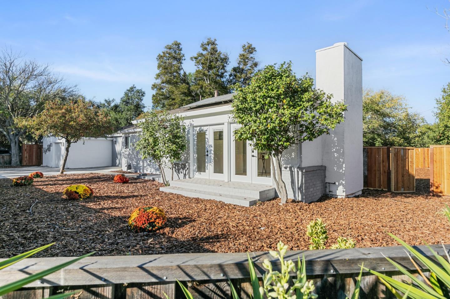 1265 Burrows Road Campbell, CA 95008 - Photo 33 of 42 a view of a house with backyard and sitting area