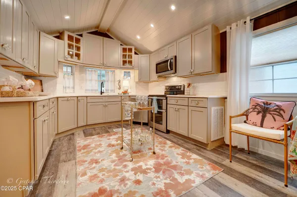 $269,900 | 1219 Thomas Drive, Unit 25, Panama City Beach, FL 32408