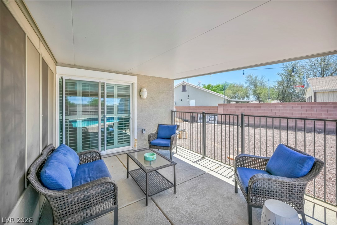 1234 Sunfire Street Henderson, NV 89014 - Photo 30 of 40 An inviting covered patio area extends relaxation space for outdoor enjoyment.