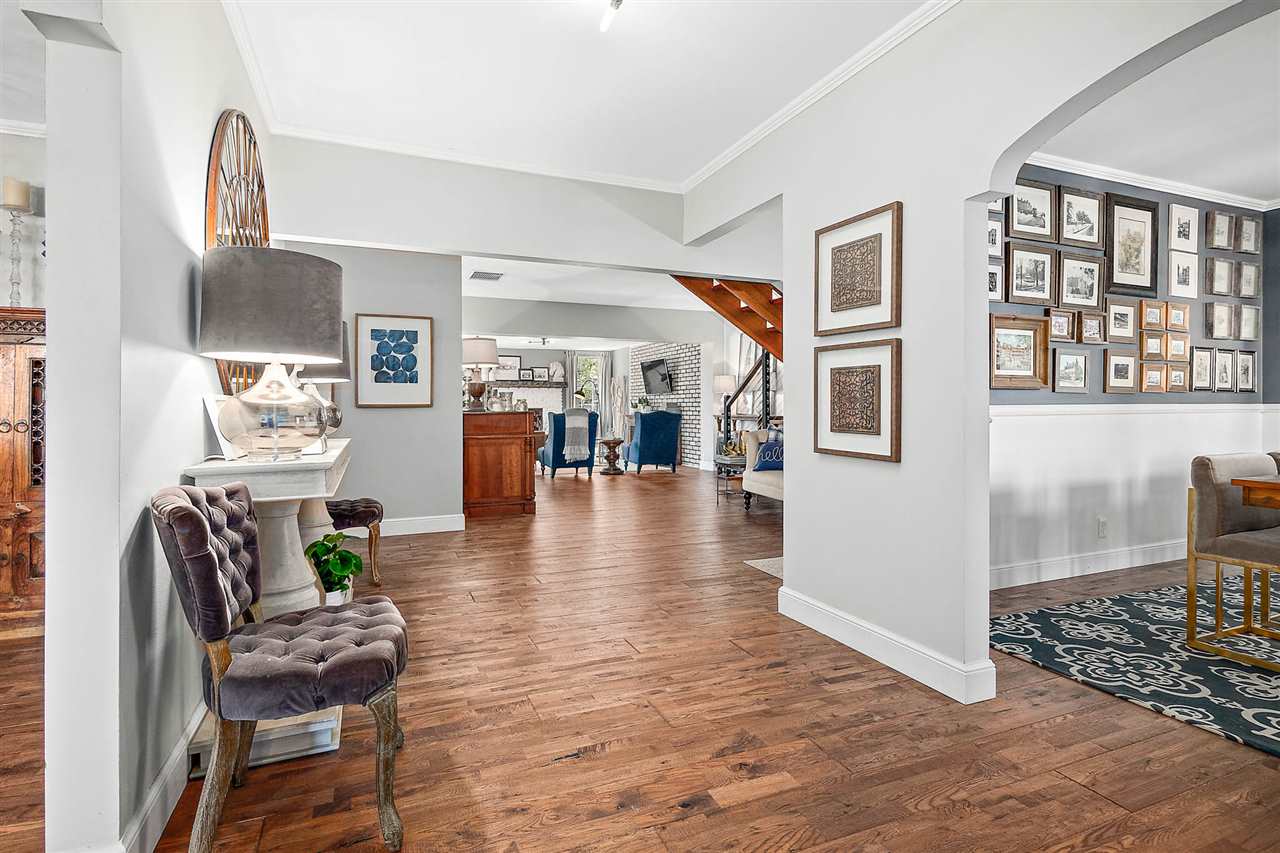 205 Oglethorpe Boulevard St. Augustine, FL 32080 - Photo 11 of 48 a living room with furniture and wooden floor