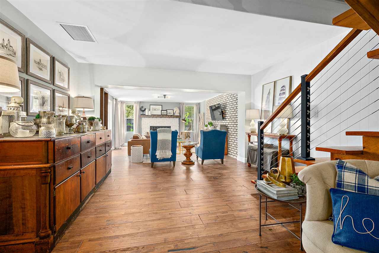 205 Oglethorpe Boulevard St. Augustine, FL 32080 - Photo 14 of 48 a living room with furniture appliances and wooden floor