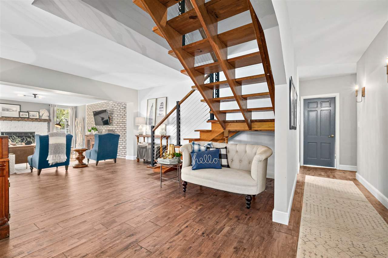 205 Oglethorpe Boulevard St. Augustine, FL 32080 - Photo 16 of 48 a living room with furniture and wooden floor