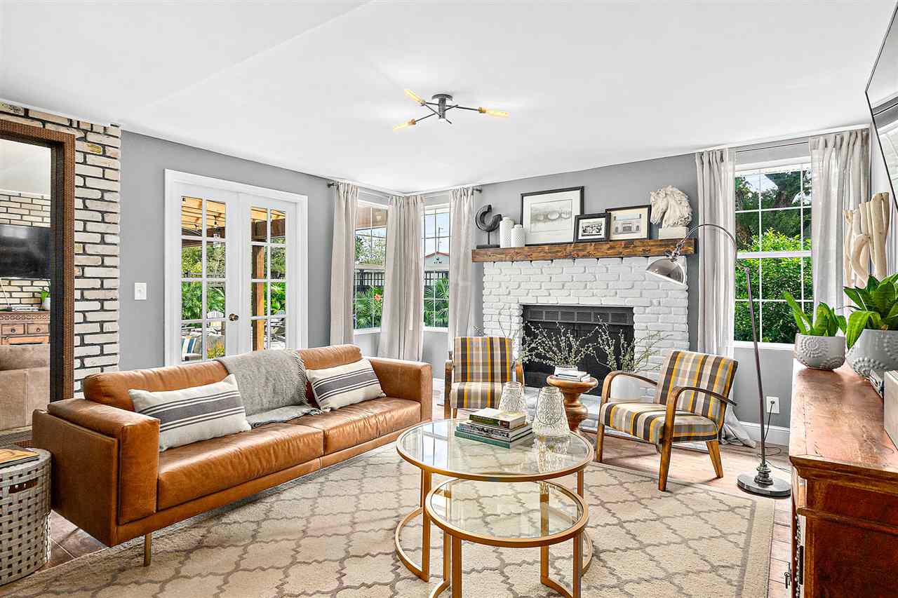 205 Oglethorpe Boulevard St. Augustine, FL 32080 - Photo 21 of 48 a living room with furniture and a fireplace