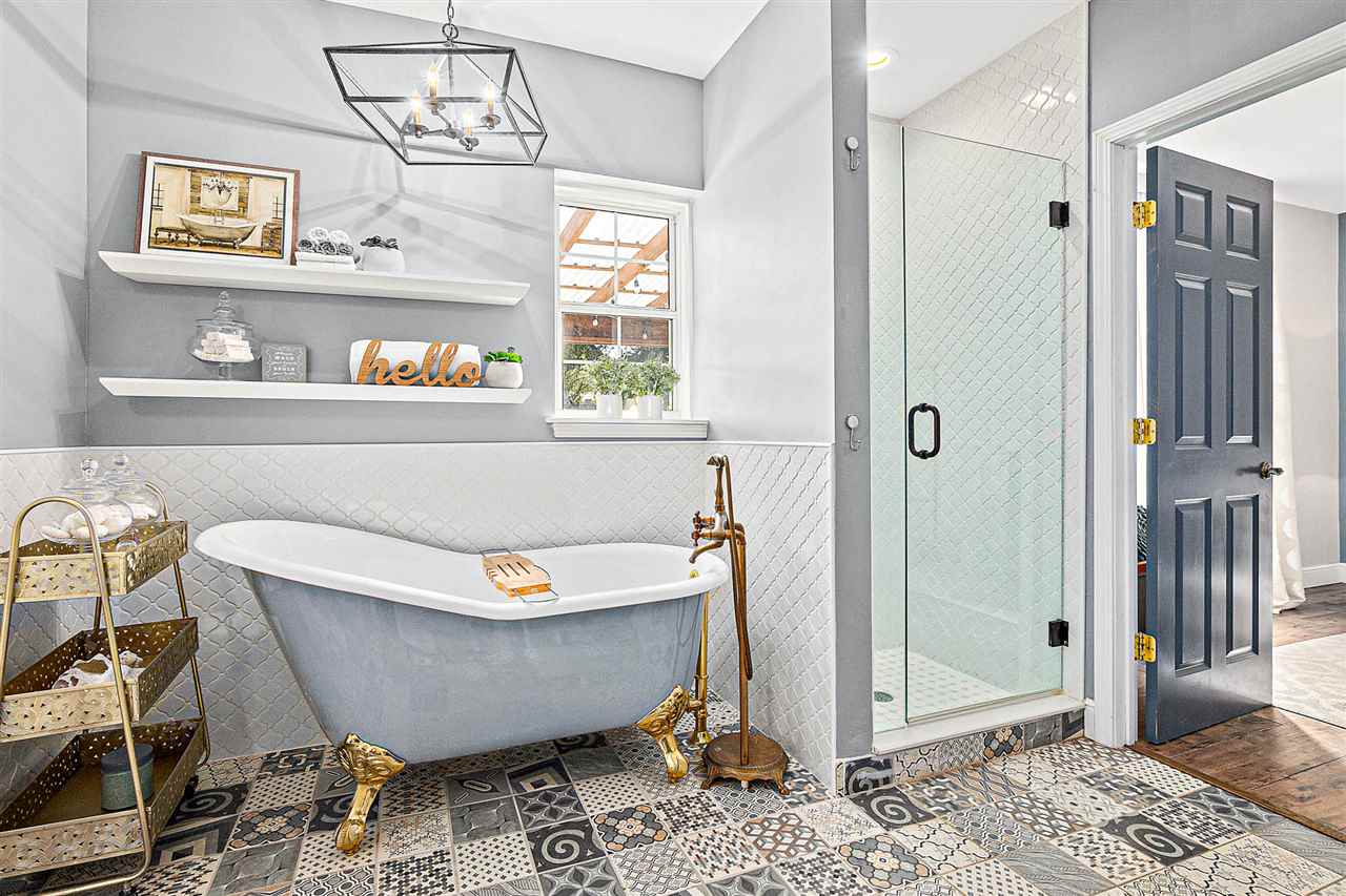 205 Oglethorpe Boulevard St. Augustine, FL 32080 - Photo 33 of 48 a spacious bathroom with a bathtub and shower